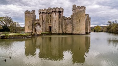 A medieval moated castle clipart
