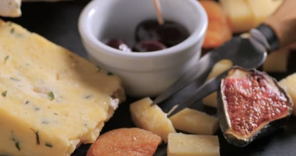 An assortment of French and British cheese — Stock Video