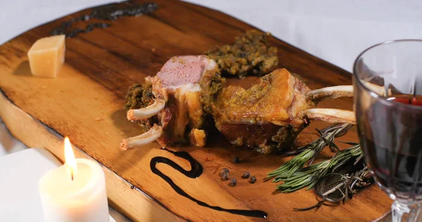 A rack of lamb with crusted mint sauce Stock Image