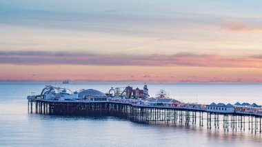 The Palace pier in Brighton at sunset clipart