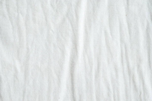 Wrinkled white cotton fabric texture background, wallpaper — Stock Photo, Image