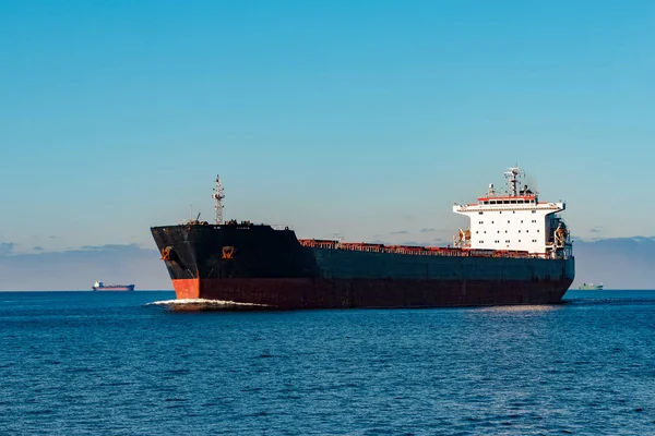 Black cargo ship — Stock Photo, Image