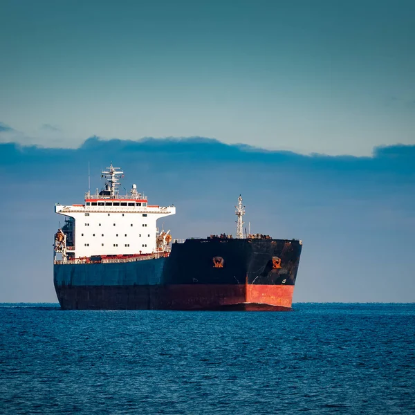 Black cargo ship