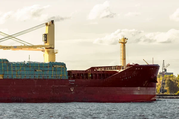Red cargo ship\'s bow