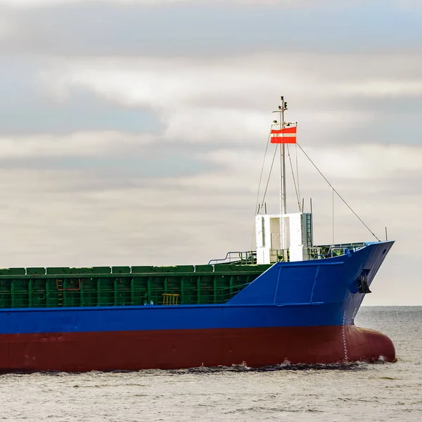 Blue cargo ship\'s bow