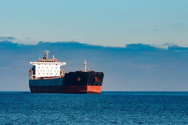 Black cargo ship — Stock Photo, Image