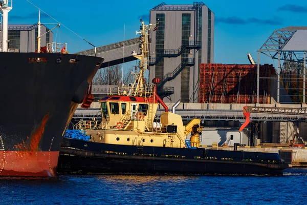 Black cargo ship mooring