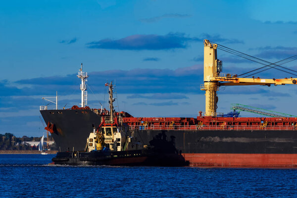 Black cargo ship mooring