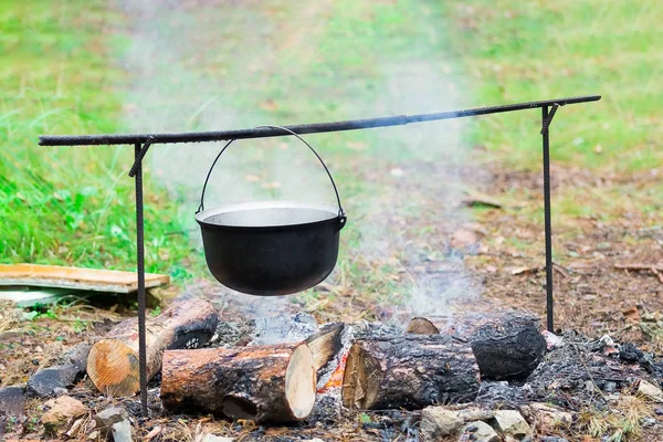 Outdoor cooking on a campfire