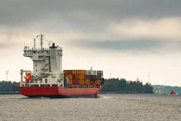 Red cargo container ship