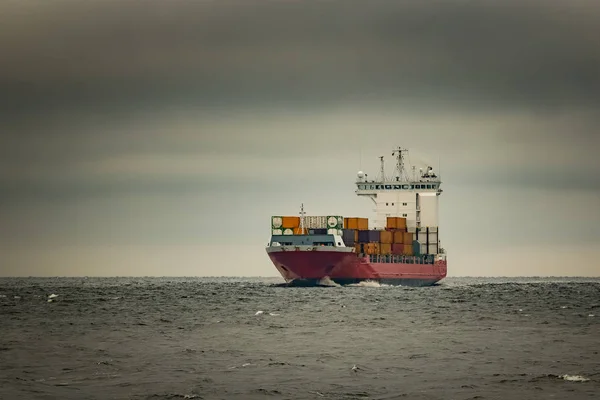 Red cargo container ship