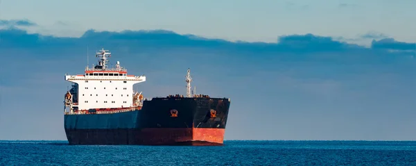 Black cargo ship — Stock Photo, Image