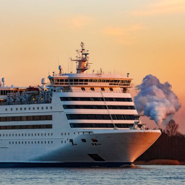 White cruise liner at sunset