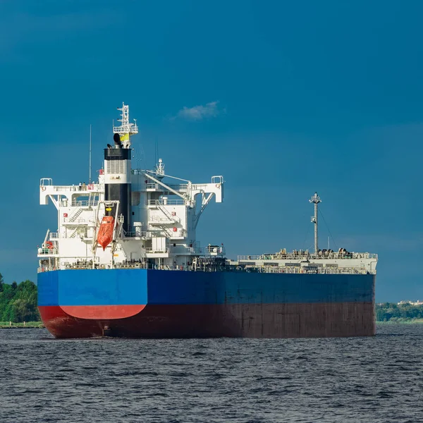 Blue cargo ship underway — Stock Photo, Image