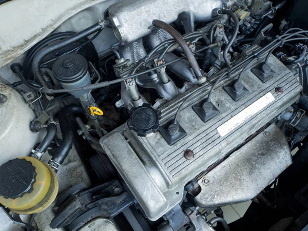 Close up old car engine full of oil stains — Stock Photo, Image