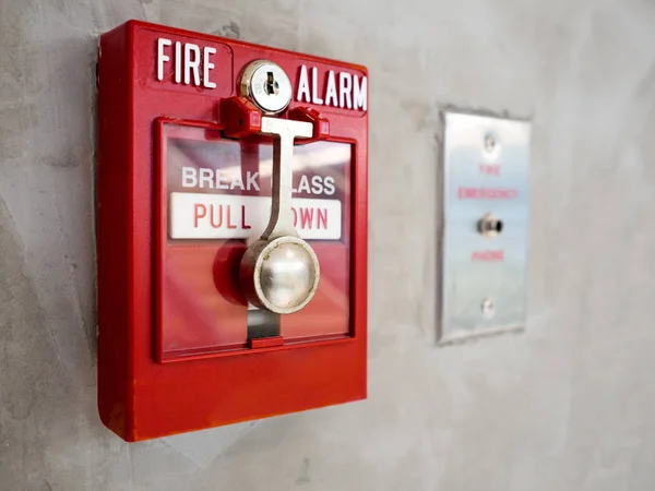 Fire alarm on mortar wall — Stock Photo, Image