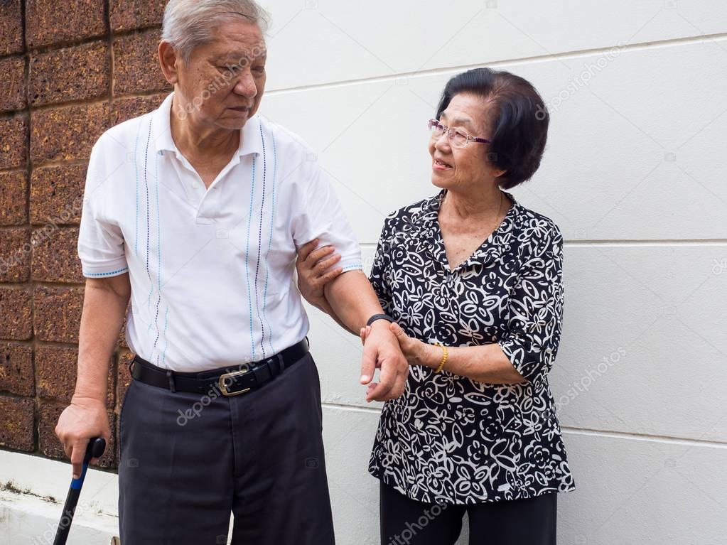 Happy romantic senior asian couple take care of each other. How long has it been.The Love has never been changed. Concept of senior couple and take care of each other