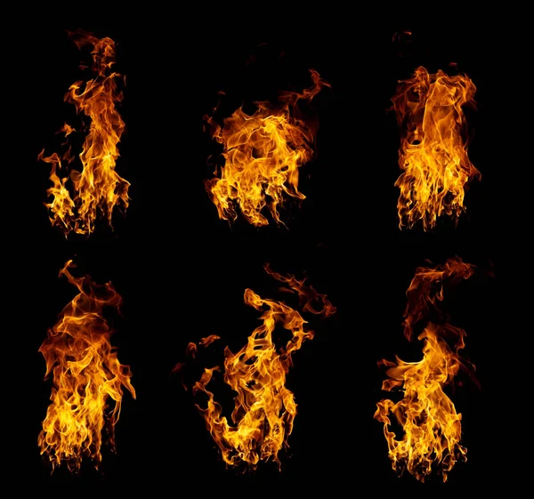 一群真正的火焰和热火焰在黑色背景上燃烧 — 图库照片
