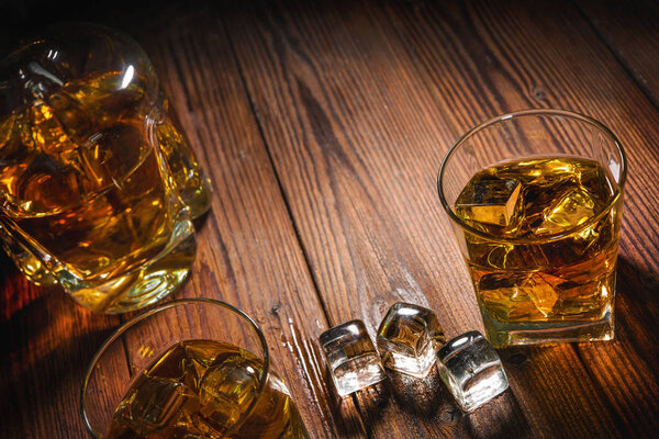 Whiskey drinks on wood