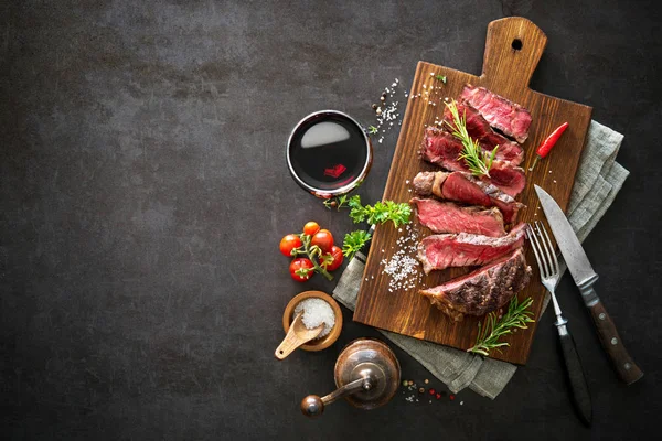 Sliced medium rare grilled beef ribeye steak — Stock Photo, Image