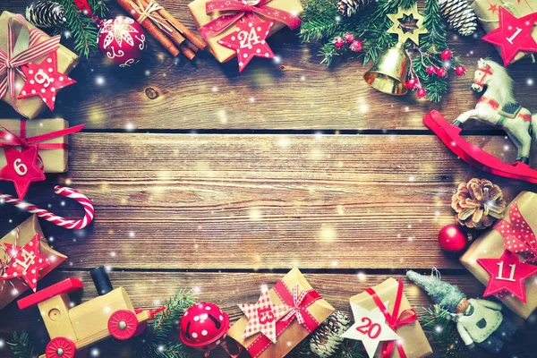 Christmas presents on wooden background — Stock Photo, Image