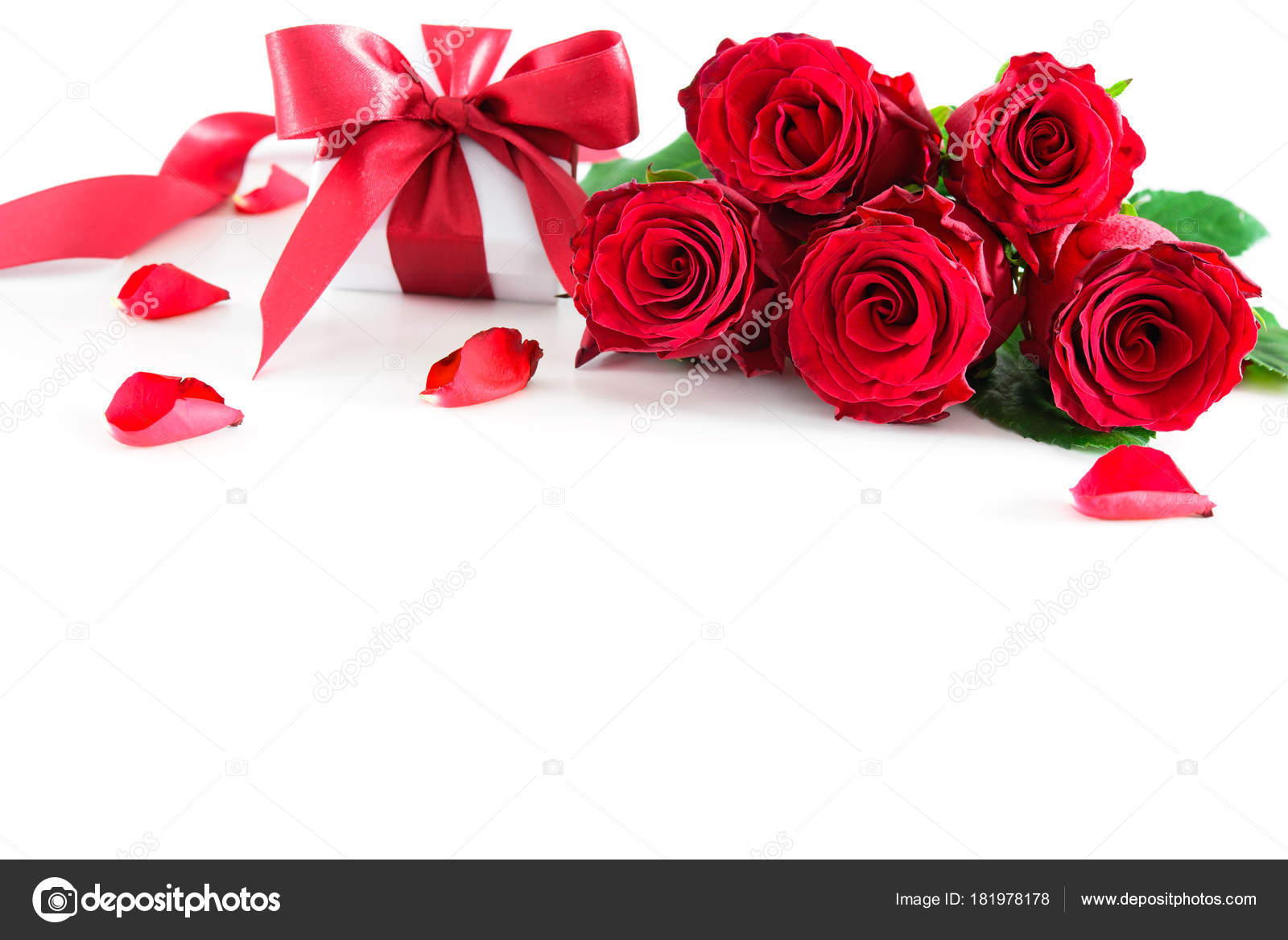 Bouquet of red roses and gift box isolated on white Stock Photo by ...