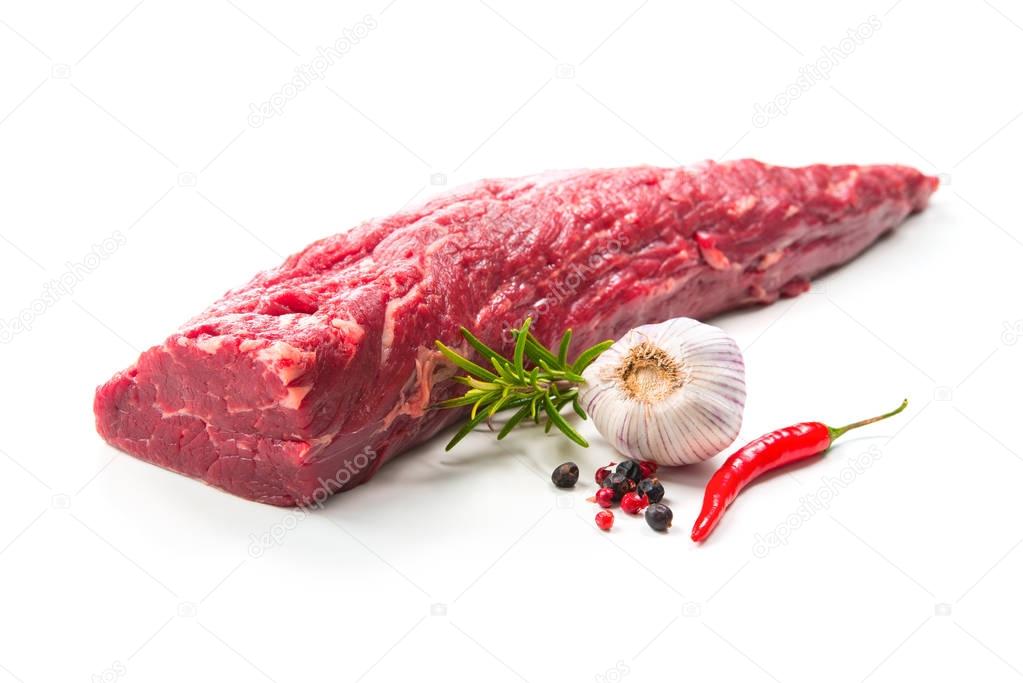 Whole piece of tenderloin ready to cook isolated on white backgr