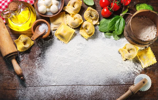 Top view on homemade pasta ravioli on old wooden table — Stock Photo, Image