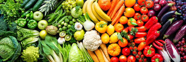 Assortment of fresh organic fruits and vegetables in rainbow col