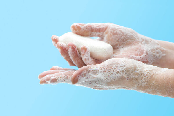 Washing hands with soap to prevent germs, bacteria or viruses. Cleaning hands. Hygiene concept
