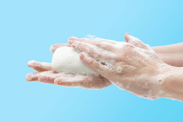Washing hands with soap to prevent germs, bacteria or viruses. Cleaning hands. Hygiene concept