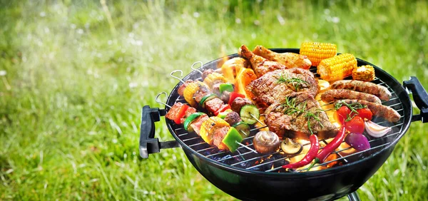 Assorted Delicious Grilled Meat Vegetables Barbecue Grill Smoke Flames Green — Stock Photo, Image