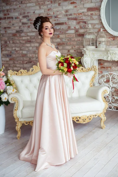 Beautiful bride in a white studio — Stock Photo, Image