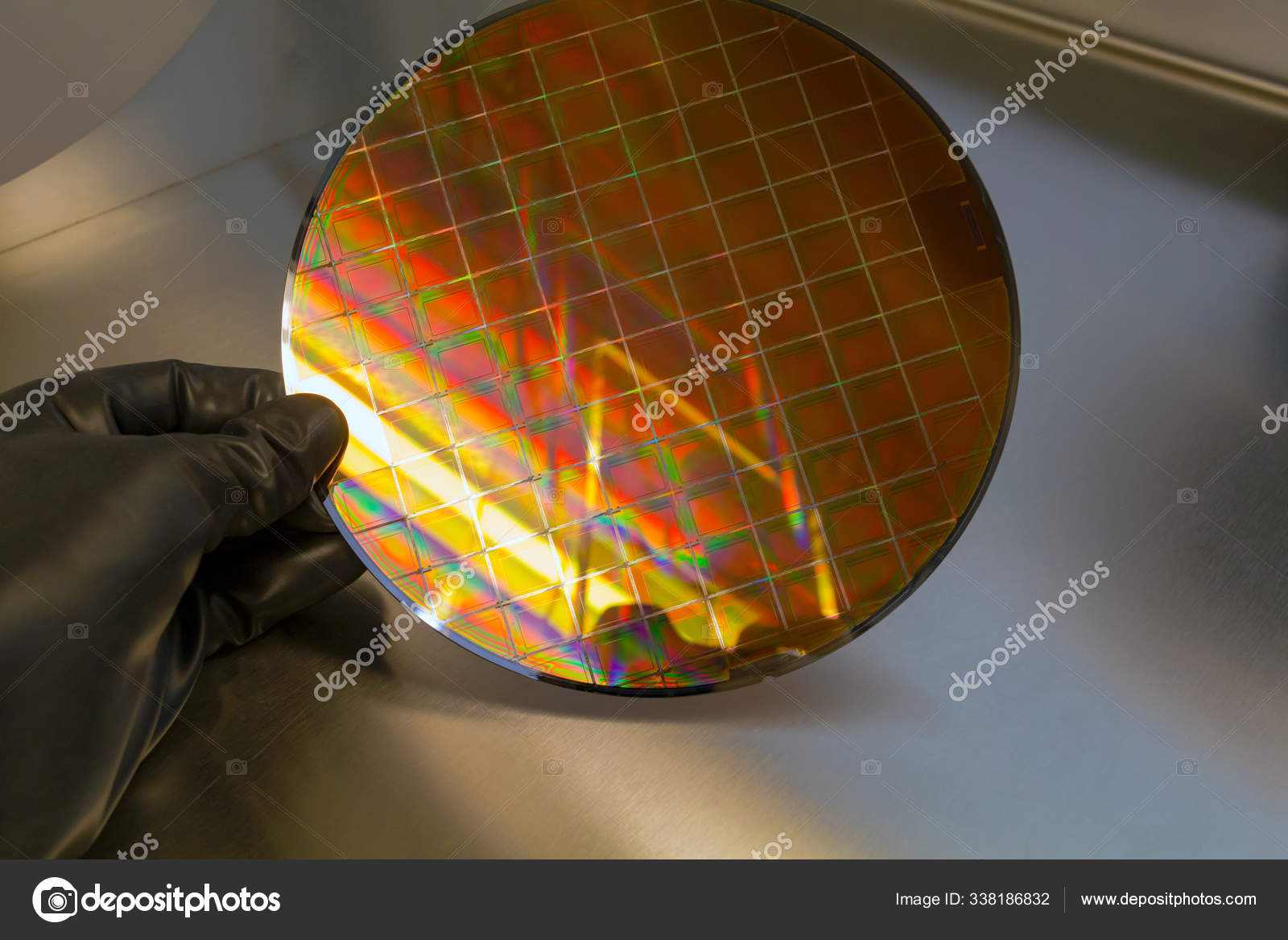 Credentials processing Grind Silicon Wafer is held in the hands by gloves inside of glovebox Stock Photo  by ©sto-noname@yandex.ru 338186832