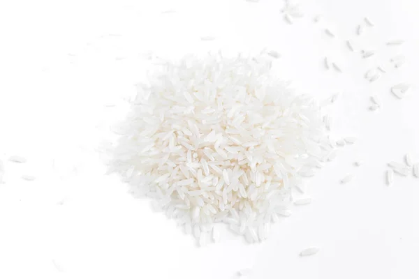 Grãos de arroz sobre um fundo branco — Fotografia de Stock