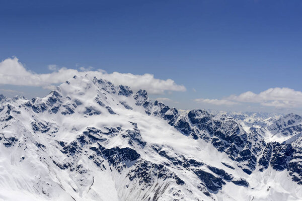 spring snow on S.Colombano peak mountaintop, Sondrio, Italy