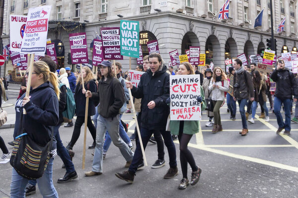 LONDON, UK - NOVEMBER 19, 2016: Students and lecturers march and protests against education bill  on the streets of london.