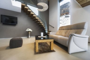 dağ manzaralı lüks evde modern tasarım oturma odası