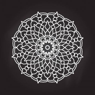 Kara tahta arka plan üzerinde soyut mandala.