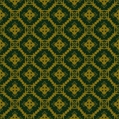 Koyu yeşil arkaplan ve güzel altın süsler.