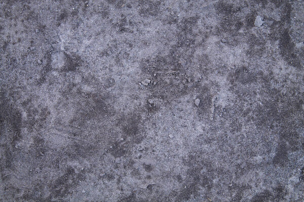 Texture of concrete. Cement. Cracks. The old invoice. Grey colour