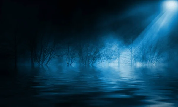 Reflection of the full moon on the water. Dark dramatic background. Moonlight, smoke and fog