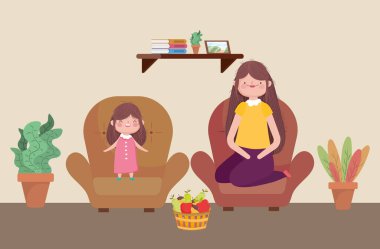 mom and girl with fruits in basket living room happy thanksgiving celebration