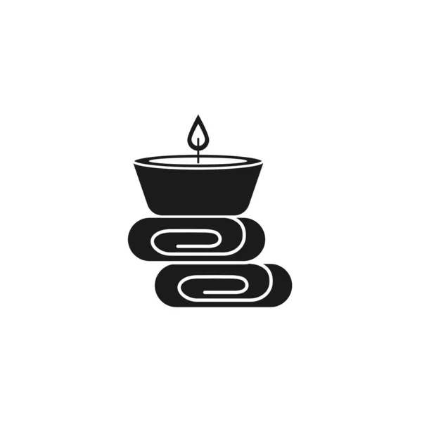 Candle with towels of spa silhouette style icon — Vector de stock