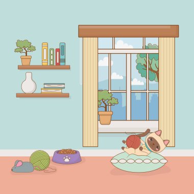 Küçük kedi maskotu salonda.