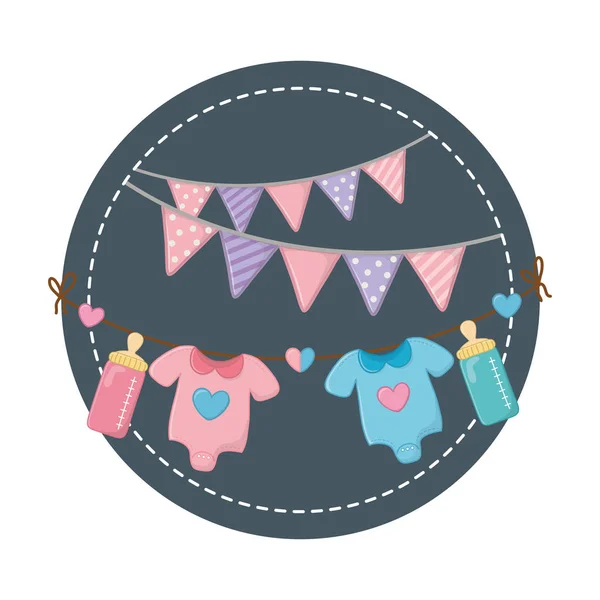Round frame with baby clothes — Stockvector