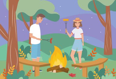 man and woman in the wood fire with sausage and cob