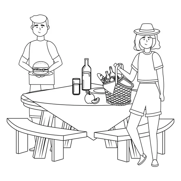 Pareja de mujer y hombre teniendo diseño de picnic — Archivo Imágenes Vectoriales