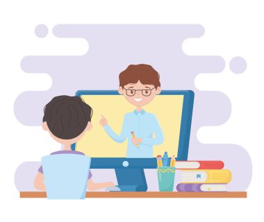 Online eğitim öğrencisi çocuk bilgisayarda video izliyor