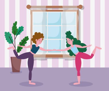 Kızlar el ele tutuşup odada yoga yapıyor, evde egzersiz yapıyor.